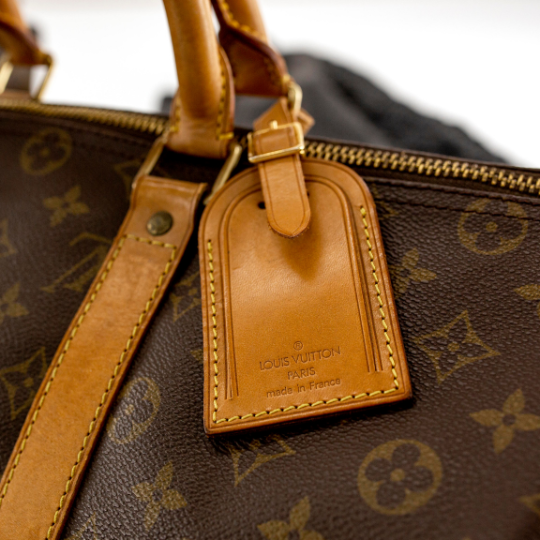 a brown Louis Vuitton handbag