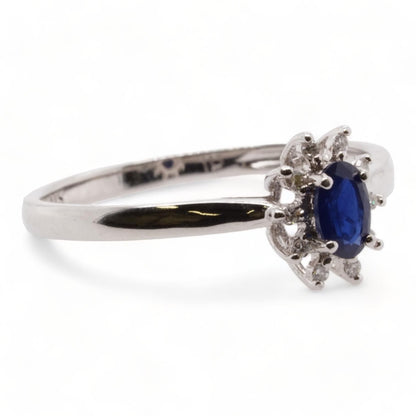14K White Gold Oval Blue Sapphire With Starburst Diamond Halo Ring