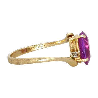 14K Gold Oval Light Purple Stone With Small Diamond Accents Bypass Ring