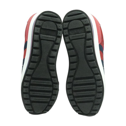 Scuffed Navy Low Top Athletic Shoes