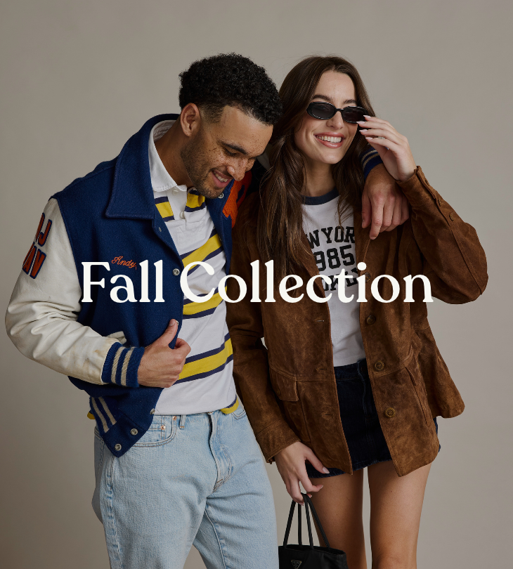 Fall Collection: two models wearing a blue varsity jacket and brown jacket with sunglasses.
