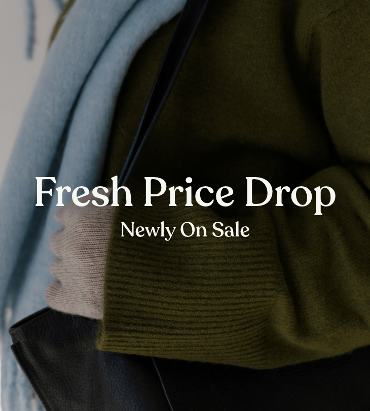 Fresh Price Drop, Newly On Sale: close-up of layered knitwear and outerwear.