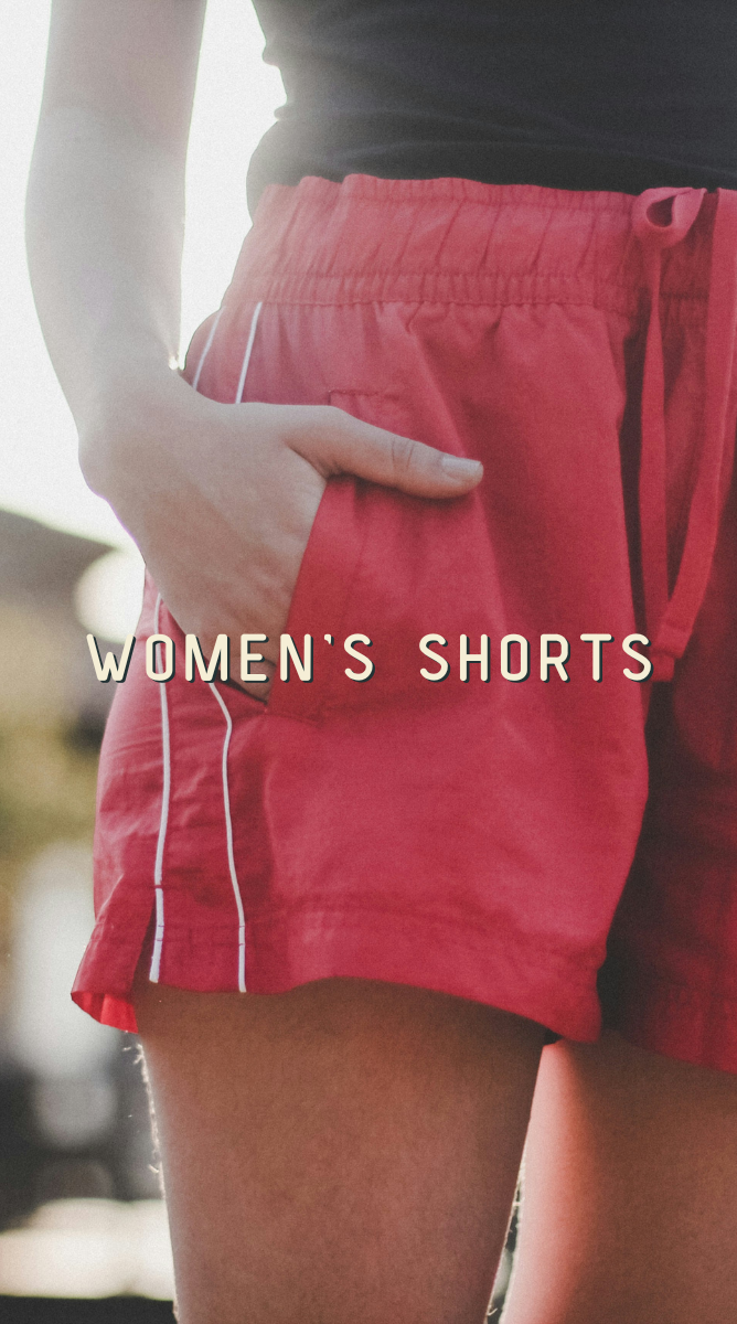 Red shorts worn by a person with text 'WOMEN'S SHORTS' displayed.