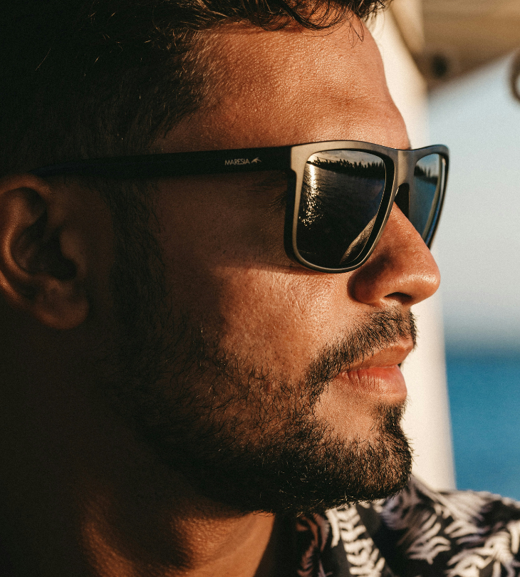 side profile of man in sunglasses
