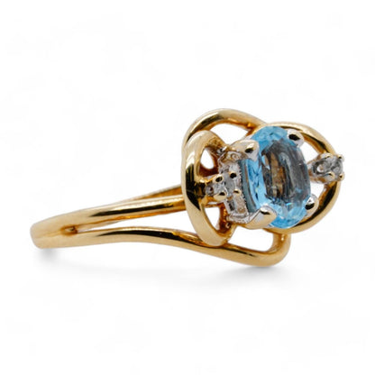 10K Gold Oval Blue Topaz With Diamond Accents Ring