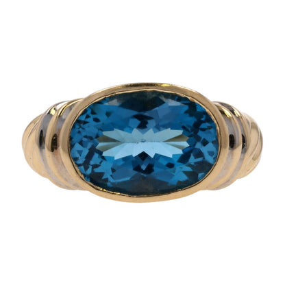 14K Two Tone Gold Side To Side Oval Blue Stone In Beveled Setting Cocktail Ring