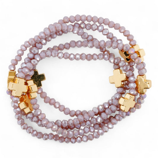 Purple Bead And Gold Cross Stack Bracelets
