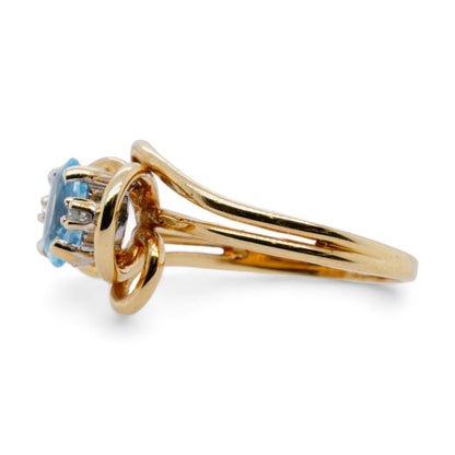 10K Gold Oval Blue Topaz With Diamond Accents Ring