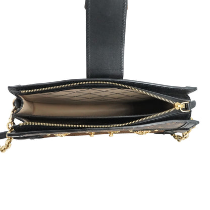 Trunk Clutch in Monogram Reverse