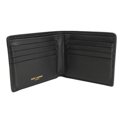 Tiny Cassandre East West Wallet in Leather