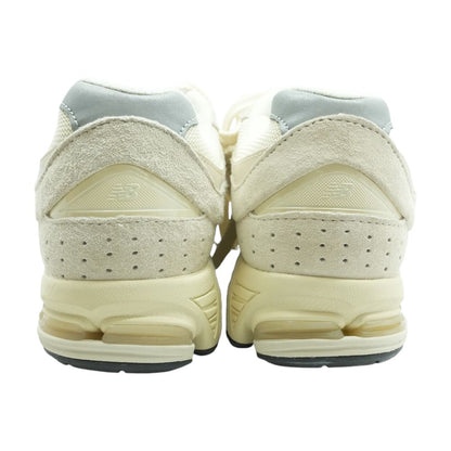 2002R Ivory Low Top Athletic Shoes