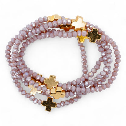 Purple Bead And Gold Cross Stack Bracelets