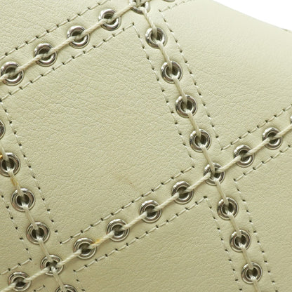 Coco Eyelets Round Flap Bag