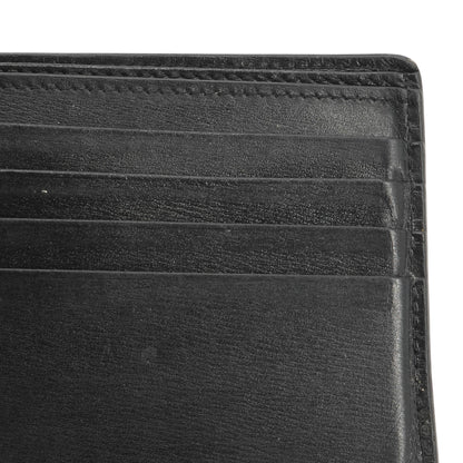 Tiny Cassandre East West Wallet in Leather
