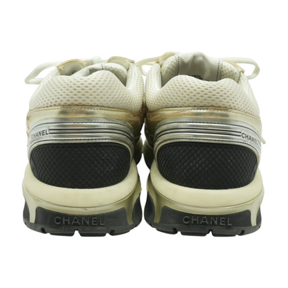 Gold and White CC Sneakers