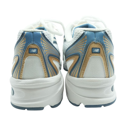 740 Gold Low Top Athletic Shoes