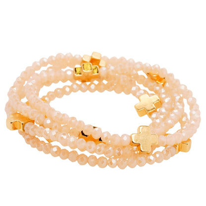 Gold Tone Cross With Beige Bead Stack Bracelets