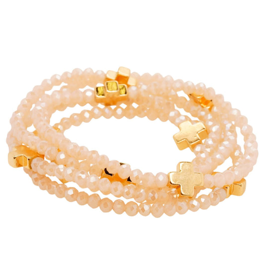 Gold Tone Cross With Beige Bead Stack Bracelets