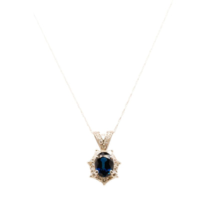 Platinum Oval Blue Sapphire With Diamond Halo Pendant Necklace