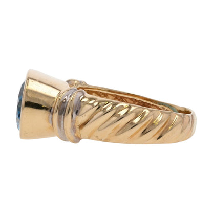 14K Two Tone Gold Side To Side Oval Blue Stone In Beveled Setting Cocktail Ring