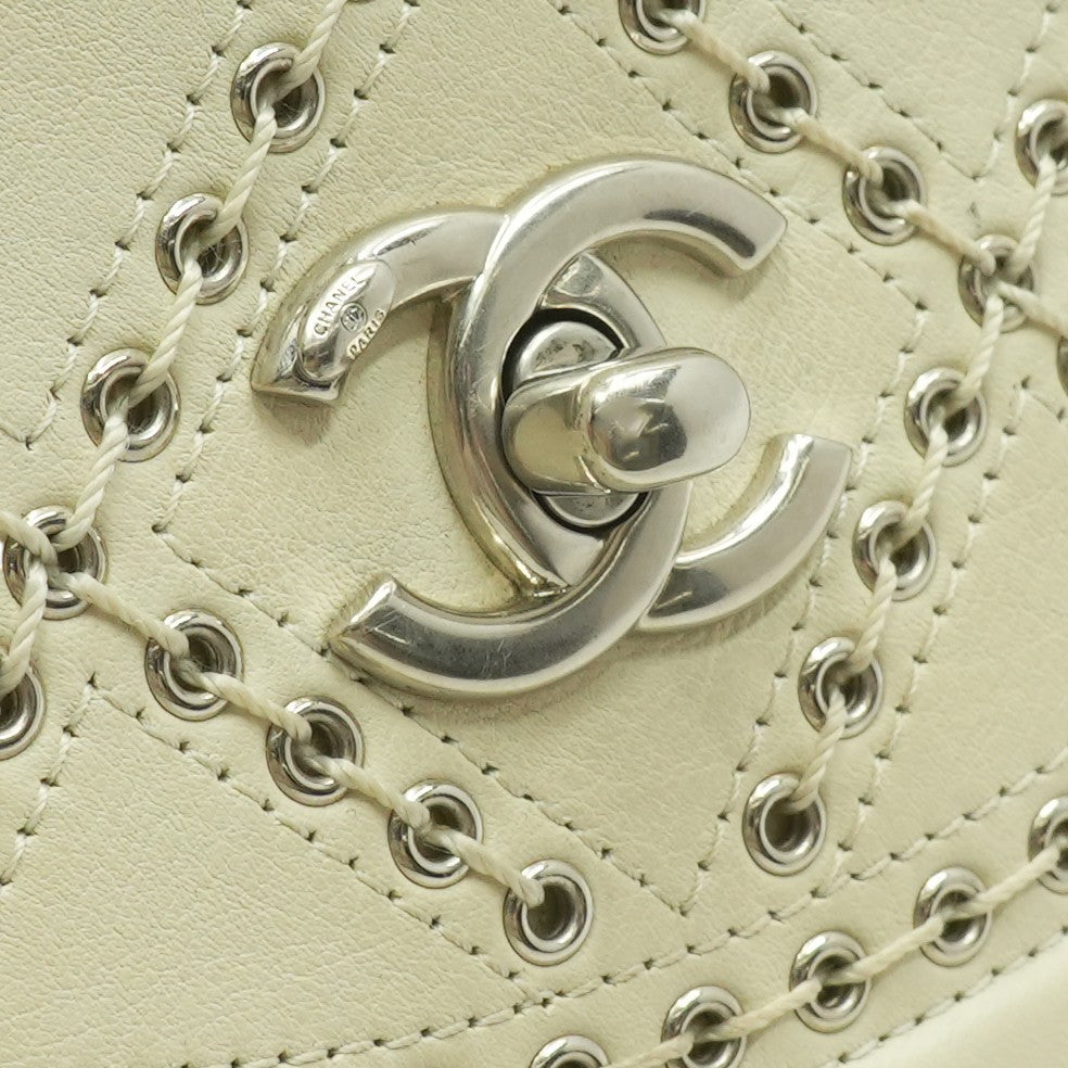 Coco Eyelets Round Flap Bag