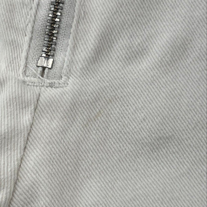White Low Rise Slim Leg Jeans