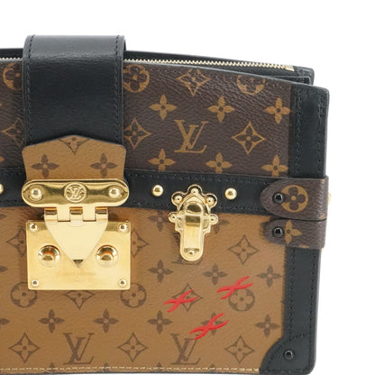 Trunk Clutch in Monogram Reverse