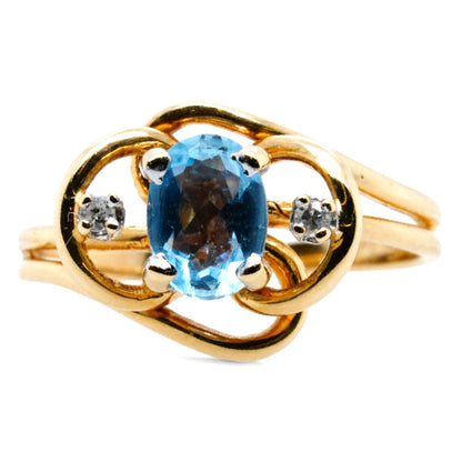 10K Gold Oval Blue Topaz With Diamond Accents Ring