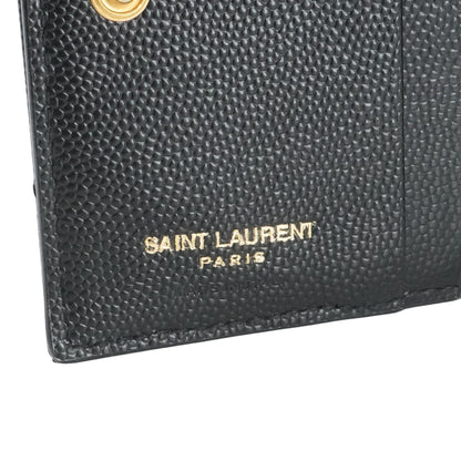 Black Cassandre Matelasse Bi-Fold Wallet in Grain De Poudre Embossed Leather