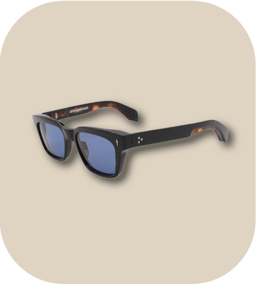 Sunglasses with tortoiseshell frame and blue lenses on a beige background
