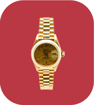 Gold watch on a red background